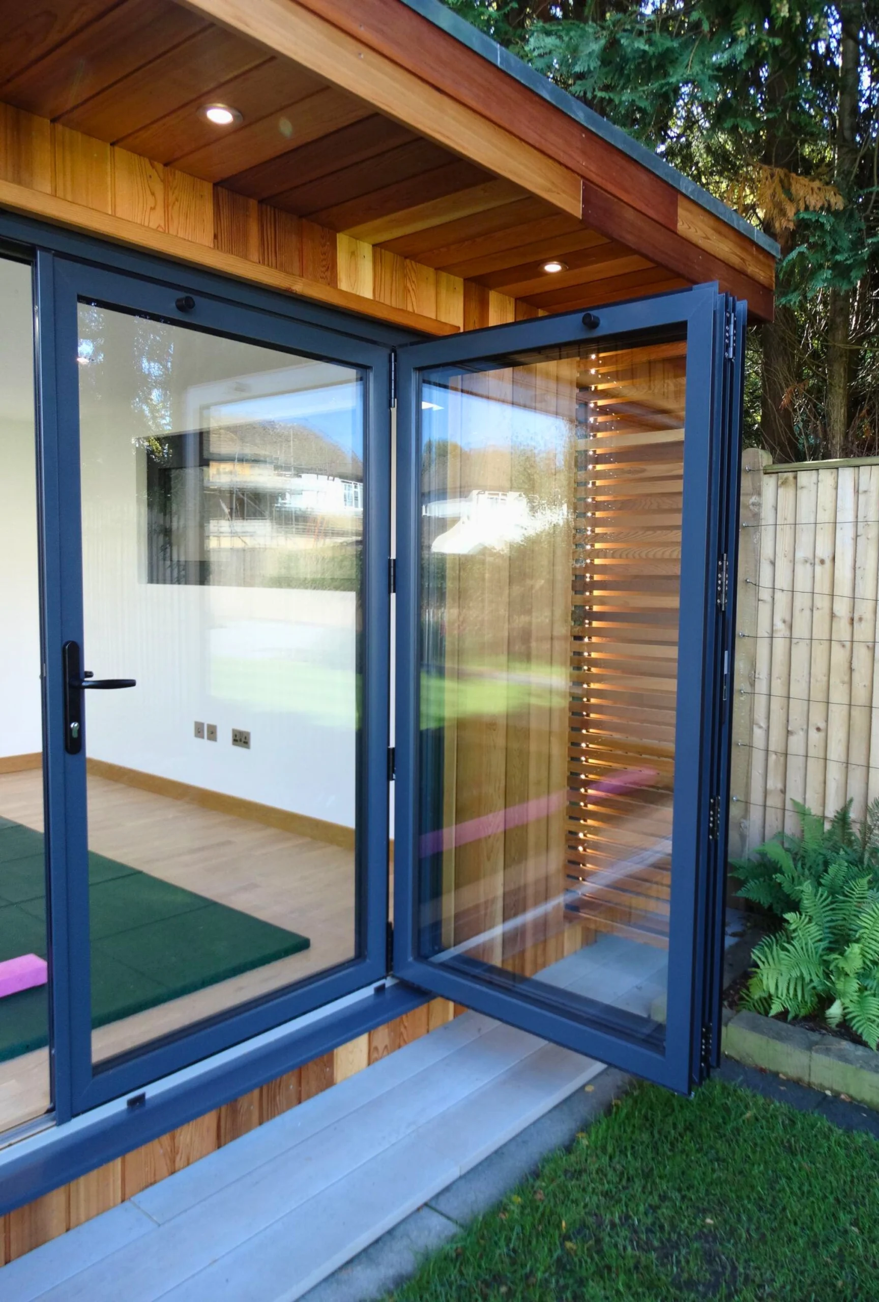 Aluminium bi-fold doors on a stunning garden room near Tunbridge Wells in Kent
