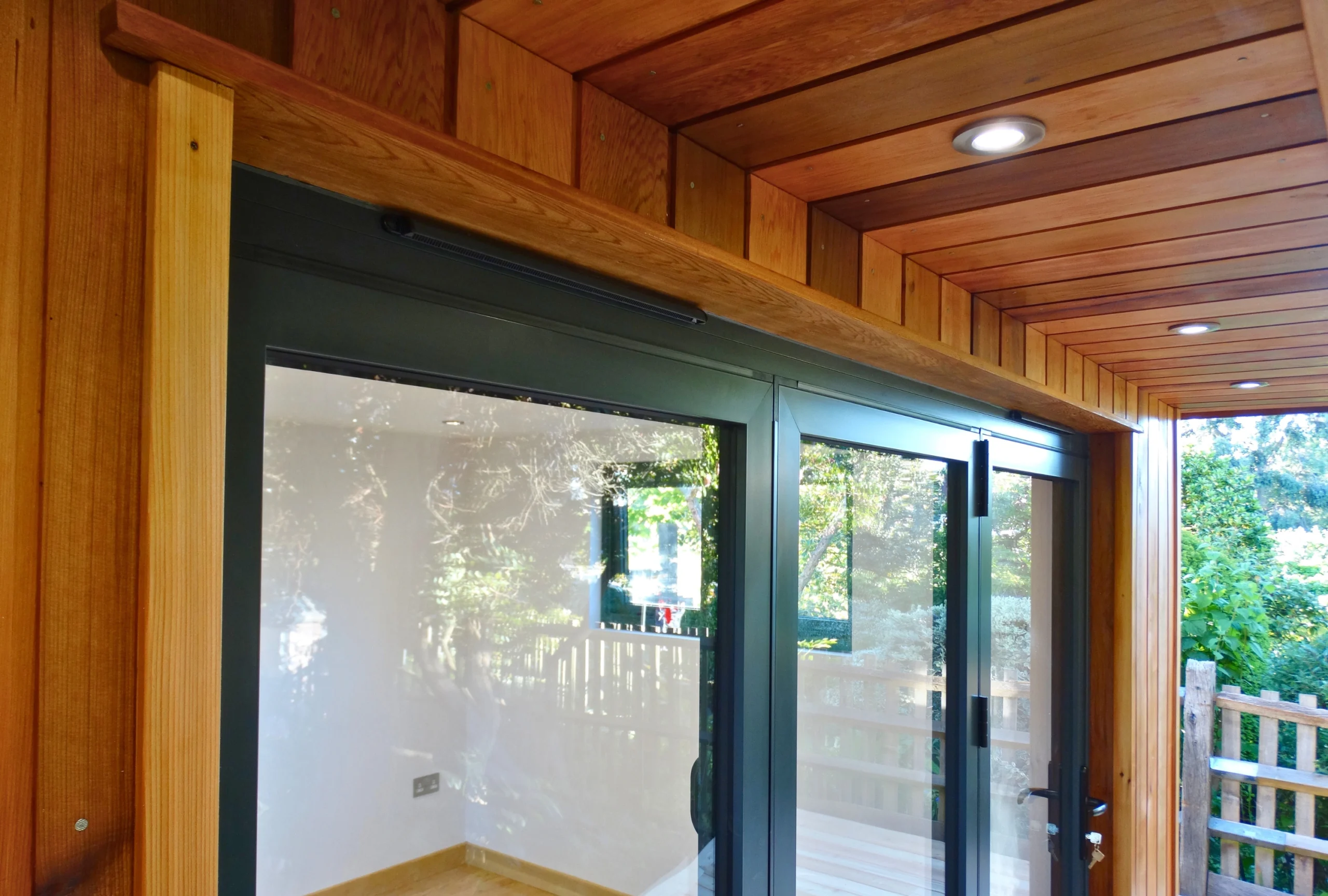 Close up of a cedar clad garden office pod in Sevenoaks, Kent